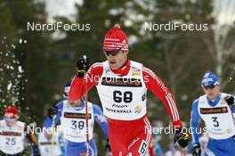 21.03.2009, Falun, Sweden (SWE): Thomas Diezig (SUI), Fischer, Rottefella, Alpina, Swix, adidas  - FIS world cup cross-country, pursuit men, Falun (SWE). www.nordicfocus.com. © Felgenhauer/NordicFocus. Every downloaded picture is fee-liable.