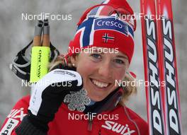 21.02.2009, Liberec, Czech Republic (CZE): Kristin Stoermer Steira (NOR), Madshus, Rottefella, One Way, Swix, silver medal pursuit - FIS nordic world ski championships, cross-country, medals, Liberec (CZE). www.nordicfocus.com. © Hemmersbach/NordicFocus. Every downloaded picture is fee-liable.