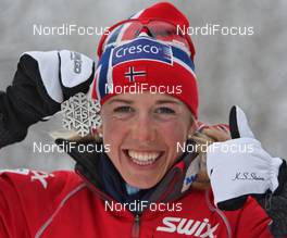 21.02.2009, Liberec, Czech Republic (CZE): Kristin Stoermer Steira (NOR), Madshus, Rottefella, One Way, Swix, silver medal pursuit - FIS nordic world ski championships, cross-country, medals, Liberec (CZE). www.nordicfocus.com. © Hemmersbach/NordicFocus. Every downloaded picture is fee-liable.