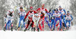 22.02.2009, Liberec, Czech Republic (CZE): group , in front Anders Soedergren (SWE), Fischer, Salomon, Craft , behind Martin Bajcicak (SVK), Fischer, Salomon, Swix, Odlo  - FIS nordic world ski championships, cross-country, pursuit men, Liberec (CZE). www.nordicfocus.com. © Domanski/NordicFocus. Every downloaded picture is fee-liable.