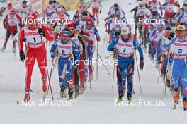 22.02.2009, Liberec, Czech Republic (CZE): group, left Dario Cologna (SUI), Fischer, Rottefella, Alpina, Swix, adidas, right Pietro Piller Cottrer (ITA), Rossignol, Rottefella, One Way  - FIS nordic world ski championships, cross-country, pursuit men, Liberec (CZE). www.nordicfocus.com. © Hemmersbach/NordicFocus. Every downloaded picture is fee-liable.