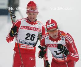 22.02.2009, Liberec, Czech Republic (CZE): l-r , Toni Livers (SUI), Madshus, Rottefella, Swix, adidas und Dario Cologna (SUI), Fischer, Rottefella, Alpina, Swix, adidas  - FIS nordic world ski championships, cross-country, pursuit men, Liberec (CZE). www.nordicfocus.com. © Domanski/NordicFocus. Every downloaded picture is fee-liable.