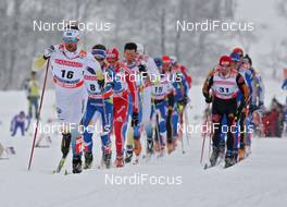 22.02.2009, Liberec, Czech Republic (CZE): group, in front Anders Soedergren (SWE), Fischer, Salomon, Craft, behind Sami Jauhojaervi (FIN), Fischer, Rottefella, Swix, right Rene Sommerfeldt (GER), Madshus, Salomon, Leki, adidas, topshot  - FIS nordic world ski championships, cross-country, pursuit men, Liberec (CZE). www.nordicfocus.com. © Hemmersbach/NordicFocus. Every downloaded picture is fee-liable.