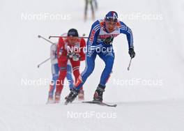 22.02.2009, Liberec, Czech Republic (CZE): Alexander Legkov (RUS), Madshus, Rottefella, Swix, adidas, behind Petter Northug (NOR), Fischer, Rottefella, Alpina, Ski Go, Swix , topshot - FIS nordic world ski championships, cross-country, pursuit men, Liberec (CZE). www.nordicfocus.com. © Hemmersbach/NordicFocus. Every downloaded picture is fee-liable.