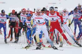 22.02.2009, Liberec, Czech Republic (CZE): group, in front Johan Olsson (SWE), Madshus, Salomon, Leki, Craft, behind right Petter Northug (NOR), Fischer, Rottefella, Alpina, Ski Go, Swix   - FIS nordic world ski championships, cross-country, pursuit men, Liberec (CZE). www.nordicfocus.com. © Hemmersbach/NordicFocus. Every downloaded picture is fee-liable.