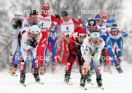22.02.2009, Liberec, Czech Republic (CZE): group , in front Anders Soedergren (SWE), Fischer, Salomon, Craft , behind Martin Bajcicak (SVK), Fischer, Salomon, Swix, Odlo , Andrus Veerpalu (EST), Fischer, Salomon, Swix  - FIS nordic world ski championships, cross-country, pursuit men, Liberec (CZE). www.nordicfocus.com. © Domanski/NordicFocus. Every downloaded picture is fee-liable.