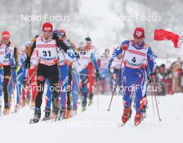 22.02.2009, Liberec, Czech Republic (CZE): group, l-r Rene Sommerfeldt (GER), Madshus, Salomon, Leki, adidas, Lukas Bauer (CZE), Fischer, Rottefella, Alpina, Swix, Toko  - FIS nordic world ski championships, cross-country, pursuit men, Liberec (CZE). www.nordicfocus.com. © Hemmersbach/NordicFocus. Every downloaded picture is fee-liable.
