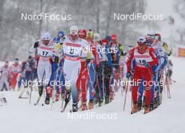 22.02.2009, Liberec, Czech Republic (CZE): group, in front l-r Andrus Veerpalu (EST), Fischer, Salomon, Swix, Johan Olsson (SWE), Madshus, Salomon, Leki, Craft, Eldar Roenning (NOR), Rossignol, Rottefella, Swix, topshot - FIS nordic world ski championships, cross-country, pursuit men, Liberec (CZE). www.nordicfocus.com. © Hemmersbach/NordicFocus. Every downloaded picture is fee-liable.