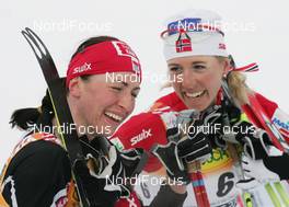 21.02.2009, Liberec, Czech Republic (CZE): l-r , Justyna Kowalczyk (POL), Fischer, Salomon, Swix , Kristin Stoermer Steira (NOR), Madshus, Rottefella, One Way, Swix  - FIS nordic world ski championships, cross-country, pursuit women, Liberec (CZE). www.nordicfocus.com. © Domanski/NordicFocus. Every downloaded picture is fee-liable.