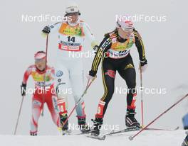 21.02.2009, Liberec, Czech Republic (CZE): group , in front Evi Sachenbacher Stehle (GER), Madshus, Rottefella, Leki, adidas behind  Charlotte Kalla (SWE), Fischer, Salomon, Swix, Craft  - FIS nordic world ski championships, cross-country, pursuit women, Liberec (CZE). www.nordicfocus.com. © Domanski/NordicFocus. Every downloaded picture is fee-liable.