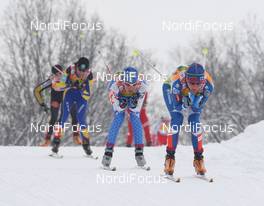 21.02.2009, Liberec, Czech Republic (CZE): group, in front Virpi Kuitunen (FIN), Rossignol, Rottefella, One Way, behind Antonella Confortola (ITA), Fischer, Salomon, Star, Rudy Project  - FIS nordic world ski championships, cross-country, pursuit women, Liberec (CZE). www.nordicfocus.com. © Hemmersbach/NordicFocus. Every downloaded picture is fee-liable.