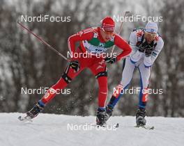27.02.2009, Liberec, Czech Republic (CZE): group, in front Toni Livers (SUI), Madshus, Rottefella, Swix, adidas, behind Aivar Rehemaa (EST), Fischer, Salomon, Swix  - FIS nordic world ski championships, cross-country, 4x10km men, Liberec (CZE). www.nordicfocus.com. © Hemmersbach/NordicFocus. Every downloaded picture is fee-liable.