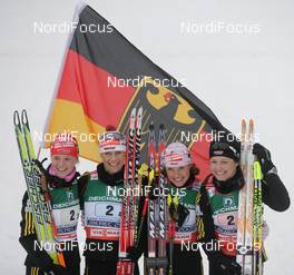26.02.2009, Liberec, Czech Republic (CZE): group, german team, l-r Miriam Goessner (GER), Fischer, Salomon, Claudia Nystad (GER), Atomic, Leki, adidas, Toko, Evi Sachenbacher Stehle (GER), Madshus, Rottefella, Leki, adidas, Katrin Zeller (GER), Rossignol, Rottefella, One Way, adidas  - FIS nordic world ski championships, cross-country, 4x5km women, Liberec (CZE). www.nordicfocus.com. © Domanski/NordicFocus. Every downloaded picture is fee-liable.