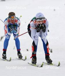26.02.2009, Liberec, Czech Republic (CZE): group, in front Triin Ojaste (EST) Fischer, Swix, Toko, Salomon, behind Marianna Longa (ITA), Fischer, Salomon, One Way  - FIS nordic world ski championships, cross-country, 4x5km women, Liberec (CZE). www.nordicfocus.com. © Hemmersbach/NordicFocus. Every downloaded picture is fee-liable.