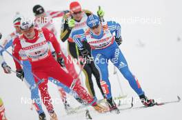 25.02.2009, Liberec, Czech Republic (CZE): group , in front Johan Kjoelstad (NOR), Rossignol, Rottefella, Swix , behind Andrey Parfenov (RUS), Fischer, Rottefella, Alpina, Swix  - FIS nordic world ski championships, cross-country, team sprint, Liberec (CZE). www.nordicfocus.com. © Domanski/NordicFocus. Every downloaded picture is fee-liable.