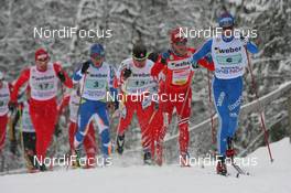 22.11.2009, Beitostoelen, Norway (NOR): Nikolai Pankratov (RUS), Madshus, Rottefella, adidas, Martin Johnsrud Sundby (NOR), Fischer, Rottefella, Alpina, Swix, Ivan Babikov (CAN), Salomon, One Way - FIS world cup cross country, 4x10km men, Beitostoelen (NOR). www.nordicfocus.com. © NordicFocus. Every downloaded picture is fee-liable.
