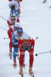 22.11.2009, Beitostoelen, Norway (NOR): Eldar Roenning (NOR), Rossignol, Rottefella, Swix, Maxim Vylegzhanin (RUS), Fischer, Rottefella, Alpina, Swix, adidas- FIS world cup cross country, 4x10km men, Beitostoelen (NOR). www.nordicfocus.com. © NordicFocus. Every downloaded picture is fee-liable.