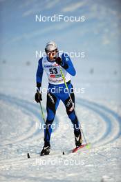 29.11.2009, Kuusamo, Finland (FIN): Christophe Perrillat (FRA), Atomic, Salomon, One Way, Odlo   - FIS world cup cross-country, 15km men, Kuusamo (FIN). www.nordicfocus.com. © NordicFocus. Every downloaded picture is fee-liable.