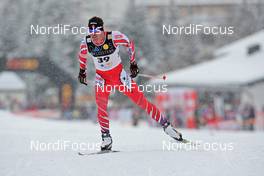 12.12.2009, Davos, Switzerland (SUI): George Grey (CAN), Fischer  - FIS world cup cross-country, 15km men, Davos (SUI). www.nordicfocus.com. © Hemmersbach/NordicFocus. Every downloaded picture is fee-liable.