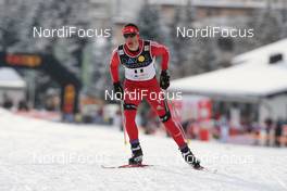 12.12.2009, Davos, Switzerland (SUI): Jonas Baumann (SUI) Atomic, Leki - FIS world cup cross-country, 15km men, Davos (SUI). www.nordicfocus.com. © Hemmersbach/NordicFocus. Every downloaded picture is fee-liable.