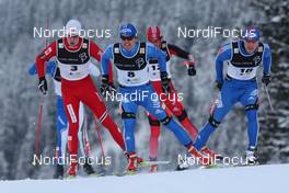 13.12.2009, Davos, Switzerland (SUI): Group, l-r: Anders Gloersen (NOR), Fischer, Maxim Vylegzhanin (RUS), Fischer, Rottefella, Alpina, Swix, adidas, Mickail Jun. Devjatiarov (RUS), Fischer, Salomon, Swix, adidas  - FIS world cup cross-country, individual sprint, Davos (SUI). www.nordicfocus.com. © Hemmersbach/NordicFocus. Every downloaded picture is fee-liable.