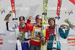 24.01.2009, Vancouver, Canada (CAN): podium, l-r Wolfgang Loitzl (AUT), Gregor Schlierenzauer (AUT), Fischer, Matti Hautamaeki (FIN)  - FIS world cup ski jumping, individual HS140, Vancouver (CAN). www.nordicfocus.com. © Hemmersbach/NordicFocus. Every downloaded picture is fee-liable.