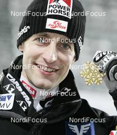 21.02.2009, Liberec, Czech Republic (CZE): Wolfgang Loitzl (AUT), Atomic gold medal - FIS nordic world ski championships, ski jumping, medals, Liberec (CZE). www.nordicfocus.com. © Furtner/NordicFocus. Every downloaded picture is fee-liable.