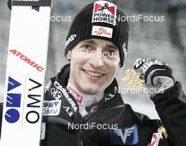 21.02.2009, Liberec, Czech Republic (CZE): Wolfgang Loitzl (AUT), Atomic gold medal - FIS nordic world ski championships, ski jumping, medals, Liberec (CZE). www.nordicfocus.com. © Furtner/NordicFocus. Every downloaded picture is fee-liable.