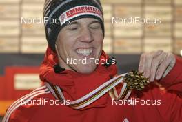 28.02.2009, Liberec, Czech Republic (CZE): Andreas Kuettel (SUI), Fischer, adidas gold medal - FIS nordic world ski championships, ski jumping, medals, Liberec (CZE). www.nordicfocus.com. © Furtner/NordicFocus. Every downloaded picture is fee-liable.