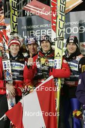 28.02.2009, Liberec, Czech Republic (CZE): Winning team Austria l-r: Thomas Morgenstern (AUT), Atomic, Martin Koch (AUT), Fischer, Gregor Schlierenzauer (AUT), Fischer, Wolfgang Loitzl (AUT), Atomic - FIS nordic world ski championships, ski jumping, team HS134, Liberec (CZE). www.nordicfocus.com. © Furtner/NordicFocus. Every downloaded picture is fee-liable.
