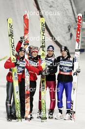 28.02.2009, Liberec, Czech Republic (CZE): Winning team Austria l-r: Gregor Schlierenzauer (AUT), Fischer, Thomas Morgenstern (AUT), Atomic, Martin Koch (AUT), Fischer, Wolfgang Loitzl (AUT), Atomic - FIS nordic world ski championships, ski jumping, team HS134, Liberec (CZE). www.nordicfocus.com. © Furtner/NordicFocus. Every downloaded picture is fee-liable.