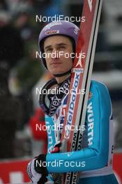 19.12.2009, Engelberg, Switzerland (SUI): Martin Schmitt (GER), Atomic  - FIS world cup ski jumping, individual HS137, Engelberg (SUI). www.nordicfocus.com. © Manzoni/NordicFocus. Every downloaded picture is fee-liable.
