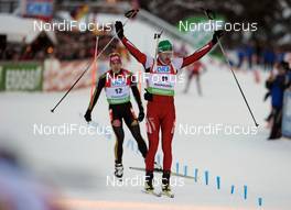 16.01.2010, Ruhpolding, Germany (GER): Simon Eder (AUT), Fischer, Rottefella, finishing third - IBU world cup biathlon, mass men, Ruhpolding (GER). www.nordicfocus.com. © Felgenhauer/NordicFocus. Every downloaded picture is fee-liable.
