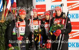 17.01.2010, Ruhpolding, Germany (GER): l-r: Halvard Hanevold (NOR), Madshus, Rottefella, Swix, Odlo, Tarjei Boe (NOR), Odlo, Swix, Ole Einar Bjoerndalen (NOR), Madshus, Rottefella, Odlo, Emil Hegle Svendsen (NOR), Madshus, Rottefella, Odlo  - IBU world cup biathlon, relay men, Ruhpolding (GER). www.nordicfocus.com. © Felgenhauer/NordicFocus. Every downloaded picture is fee-liable.