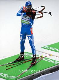 17.01.2010, Ruhpolding, Germany (GER): Anton Shipulin (RUS), Madshus, Rottefella, adidas, shooting all alone - IBU world cup biathlon, relay men, Ruhpolding (GER). www.nordicfocus.com. © Felgenhauer/NordicFocus. Every downloaded picture is fee-liable.