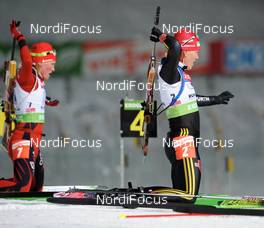 15.01.2010, Ruhpolding, Germany (GER): l-r: Tora Berger (NOR), Fischer, Rottefella, Odlo, Kati Wilhelm (GER), Madshus, Rottefella, Swix, adidas  - IBU world cup biathlon, relay women, Ruhpolding (GER). www.nordicfocus.com. © Felgenhauer/NordicFocus. Every downloaded picture is fee-liable.