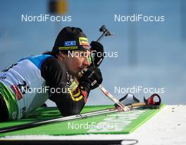 14.01.2010, Ruhpolding, Germany (GER): Christoph Stephan (GER), Fischer, adidas, Toko while zeroing - IBU world cup biathlon, sprint men, Ruhpolding (GER). www.nordicfocus.com. © Felgenhauer/NordicFocus. Every downloaded picture is fee-liable.
