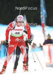 21.01.2010, Antholz, Italy (ITA): Tomasz Sikora (POL), Fischer, Rottefella, Alpina, Swix  - IBU world cup biathlon, individual men, Antholz (ITA). www.nordicfocus.com. © Manzoni/NordicFocus. Every downloaded picture is fee-liable.