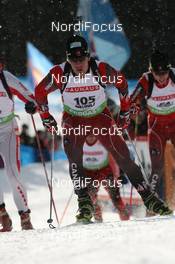 21.01.2010, Antholz, Italy (ITA): Marc-Andre Bedard (CAN), Fischer, Rottefella, Swix - IBU world cup biathlon, individual men, Antholz (ITA). www.nordicfocus.com. © Manzoni/NordicFocus. Every downloaded picture is fee-liable.