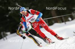 21.01.2010, Antholz, Italy (ITA): Roman Dostal (CZE), Fischer, Rottefella, Alpina, Swix - IBU world cup biathlon, individual men, Antholz (ITA). www.nordicfocus.com. © Manzoni/NordicFocus. Every downloaded picture is fee-liable.