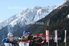 22.01.2010, Antholz, Italy (ITA): Martina Beck (GER), Rossignol, Rottefella, Madshus, Swix, adidas, Toko and Sylvie Becaert (FRA), Fischer, Rottefella, Exel, Odlo - IBU world cup biathlon, sprint women, Antholz (ITA). www.nordicfocus.com. © Manzoni/NordicFocus. Every downloaded picture is fee-liable.