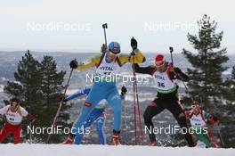 20.03.2010, Holmenkollen, Norway (NOR): Serhiy Semenov (UKR), Fischer, Rottefella, Alpina, Swix, Alexander Wolf (GER), Fischer, Rottefella, Alpina, Leki adidas, Toko - IBU world cup biathlon, pursuit men, Holmenkollen (NOR). www.nordicfocus.com. © Manzoni/NordicFocus. Every downloaded picture is fee-liable.