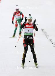 20.03.2010, Holmenkollen, Norway (NOR): Simone Hauswald (GER), Fischer, Rottefella, Exel, adidas, Toko wins ahead of Darya Domracheva (BLR), Fischer, Rottefella, Swix - IBU world cup biathlon, pursuit women, Holmenkollen (NOR). www.nordicfocus.com. © Manzoni/NordicFocus. Every downloaded picture is fee-liable.