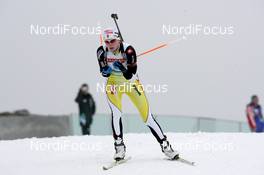 18.03.2010, Holmenkollen, Norway (NOR): Anastasiya Kuzmina (SVK), Fischer, Salomon, Exel - IBU world cup biathlon, sprint women, Holmenkollen (NOR). www.nordicfocus.com. © Manzoni/NordicFocus. Every downloaded picture is fee-liable.