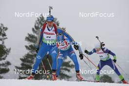 18.03.2010, Holmenkollen, Norway (NOR): Anna Carin Olofsson-Zidek (SWE), Madshus, Rottefella, Alpina, Leki, adidas leads Svetlana Sleptsova (RUS), Madshus, Rottefella, Alpina, Swix, adidas - IBU world cup biathlon, sprint women, Holmenkollen (NOR). www.nordicfocus.com. © Manzoni/NordicFocus. Every downloaded picture is fee-liable.