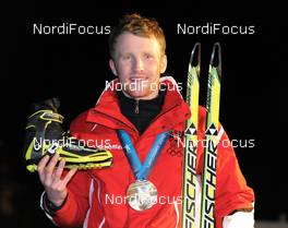 26.02.2010, Whistler, Canada (CAN): Simon Eder (AUT), Fischer, Rottefella  - Olympic Winter Games Vancouver 2010, biathlon, medals, Whistler (CAN). www.nordicfocus.com. © NordicFocus. Every downloaded picture is fee-liable.