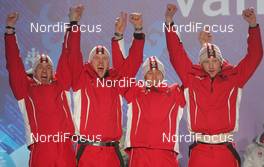 26.02.2010, Whistler, Canada (CAN): podium: l-r:  Christoph Sumann (AUT), Atomic, Leki,  Dominik Landertinger (AUT), Fischer, Rottefella,  Daniel Mesotitsch (AUT), Fischer, Rottefella, Simon Eder (AUT), Fischer, Rottefella, - Olympic Winter Games Vancouver 2010, biathlon, medals, Whistler (CAN). www.nordicfocus.com. © NordicFocus. Every downloaded picture is fee-liable.