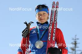 21.02.2010, Whistler, Canada (CAN): Olga Zaitseva (RUS), Madshus, Rottefella, Alpina, Swix, adidas - Olympic Winter Games Vancouver 2010, biathlon, medals, Whistler (CAN). www.nordicfocus.com. © NordicFocus. Every downloaded picture is fee-liable.