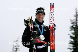23.02.2010, Whistler, Canada (CAN): Christoph Sumann (AUT), Atomic, Leki  - Olympic Winter Games Vancouver 2010, biathlon, medals, Whistler (CAN). www.nordicfocus.com. © NordicFocus. Every downloaded picture is fee-liable.