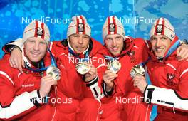 26.02.2010, Whistler, Canada (CAN): l-r: Simon Eder (AUT), Fischer, Rottefella, Daniel Mesotitsch (AUT), Fischer, Rottefella, Dominik Landertinger (AUT), Fischer, Rottefella, Christoph Sumann (AUT), Atomic, Leki  - Olympic Winter Games Vancouver 2010, biathlon, medals, Whistler (CAN). www.nordicfocus.com. © NordicFocus. Every downloaded picture is fee-liable.